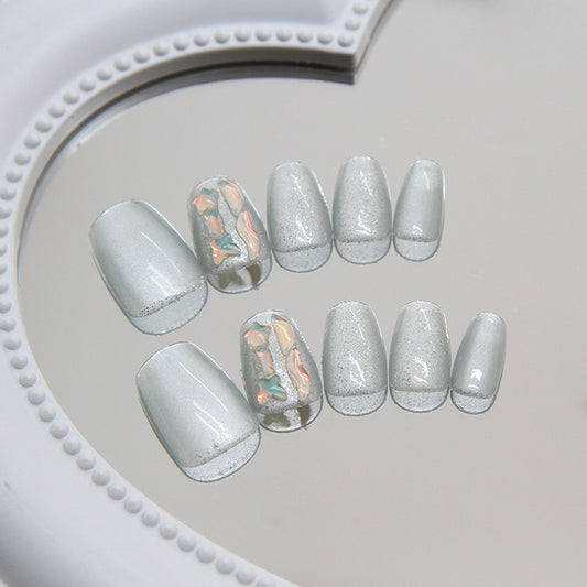 Elegant Serenity Medium Almond Glittery Light Grey Press On Nail Set with Iridescent Accent Design