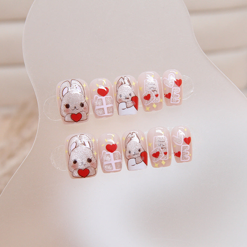 Whimsical Bunny-Themed Short Round Press-On Nail Set in White with Adorable Cartoon Accents and Glitter Detail