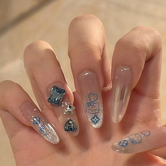 Enchanted Elegance Long Almond Clear Glitter Accents Press On Nail Set with Rhinestone Embellishments