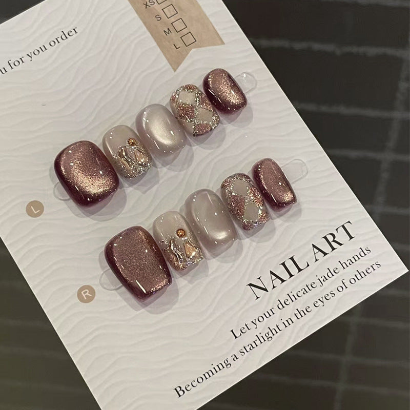 Set of glittery nail art on a card with text