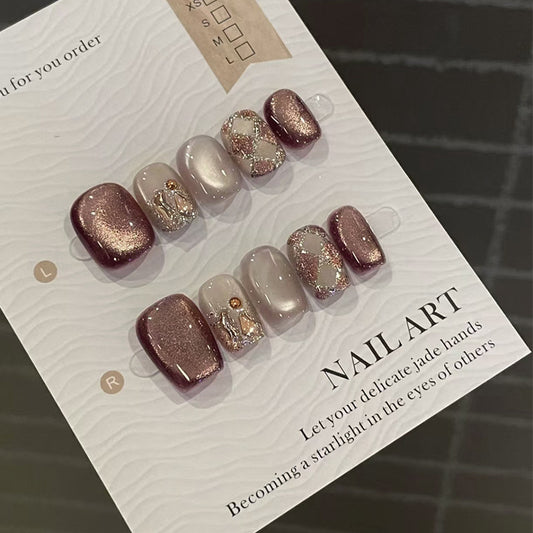 Set of glittery nail art on a card with text