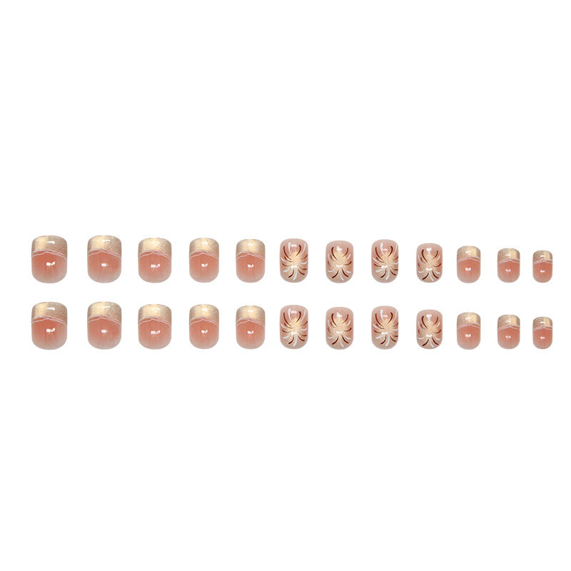 A set of square-shaped, pink false nails with a floral pattern.