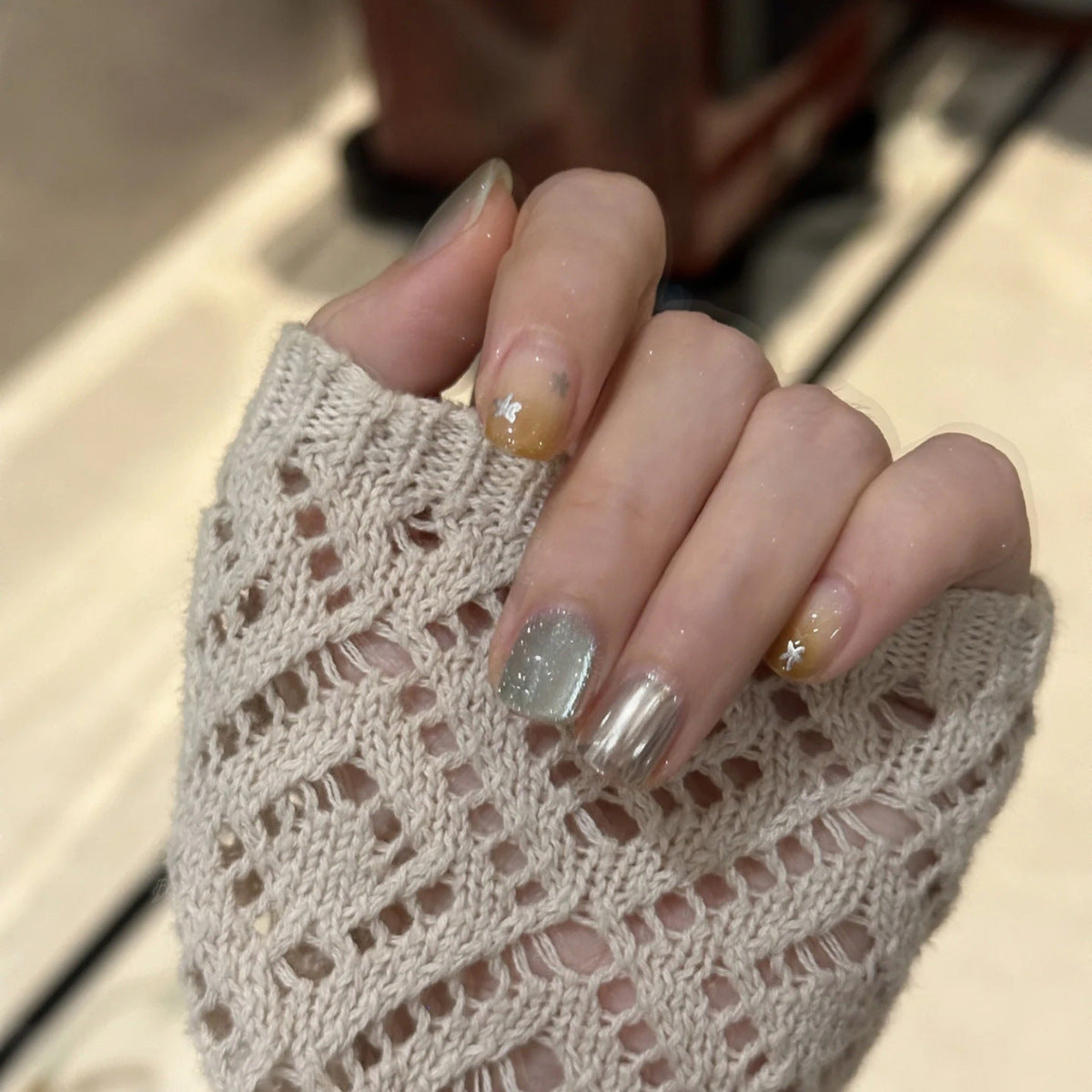 Celestial Dream Medium Square Press On Nail Set in Glittery Green Shimmer with Frosted Gold Accents and Starry Designs