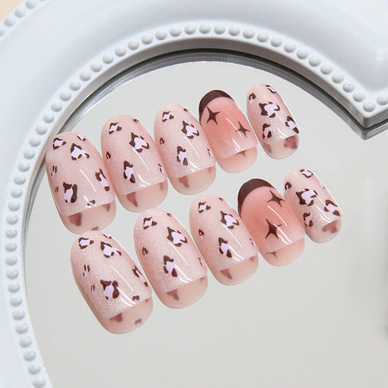 Chic Safari Inspired Short Round Blush Pink Nails with Stunning Leopard Print Design