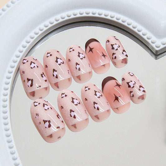 Chic Safari Inspired Short Round Blush Pink Nails with Stunning Leopard Print Design