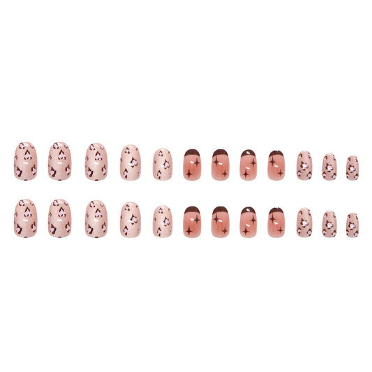 Chic Wildlife Inspired Short Oval Shaped Blush Pink Press On Nail Set with Unique Leopard Print Design