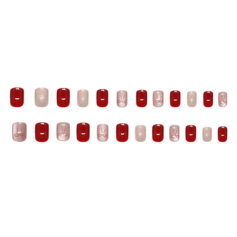 Festive Elegance Short Squoval Red and Glittery Beige Nail Set with Charming Designs