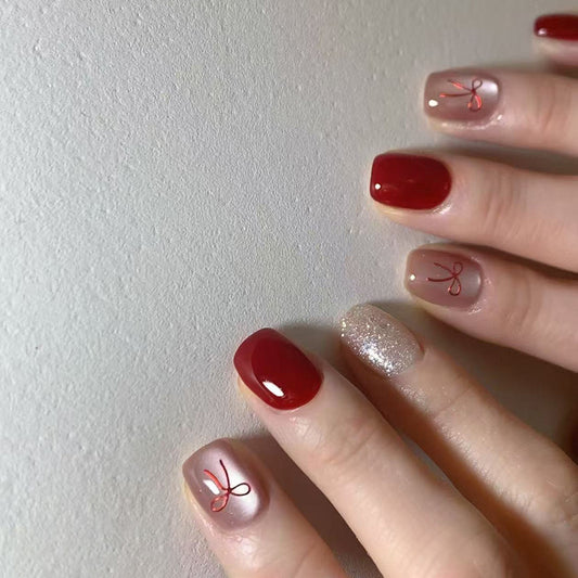Chic Elegance Squoval Short Deep Red with Glittery Accent and Whimsical Design Press On Nail Set