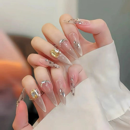 Elegant Enchantment Long Almond Beige Nails with Sparkling Gemstone Accents