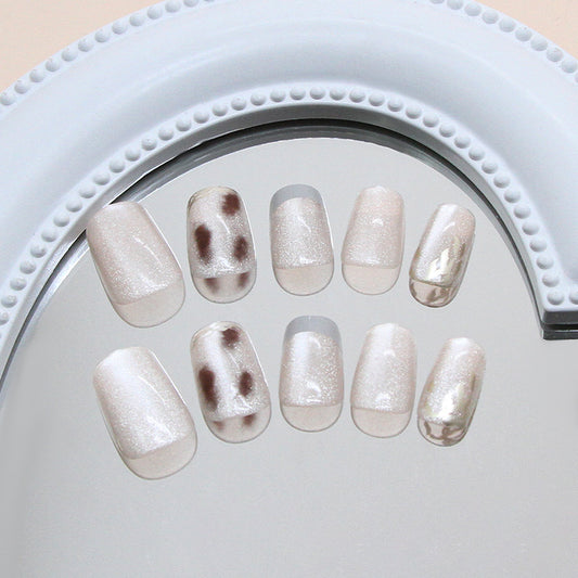Elegant Serenity Short Squoval Translucent Light Beige Press-On Nail Set with Unique Shimmer Effect