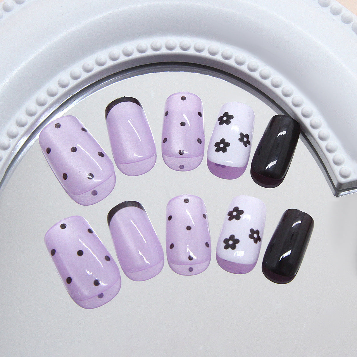 Whimsical Floral Dream Lavender Short Square Press On Nail Set Featuring Charming Polka Dots and Elegant Black Accents