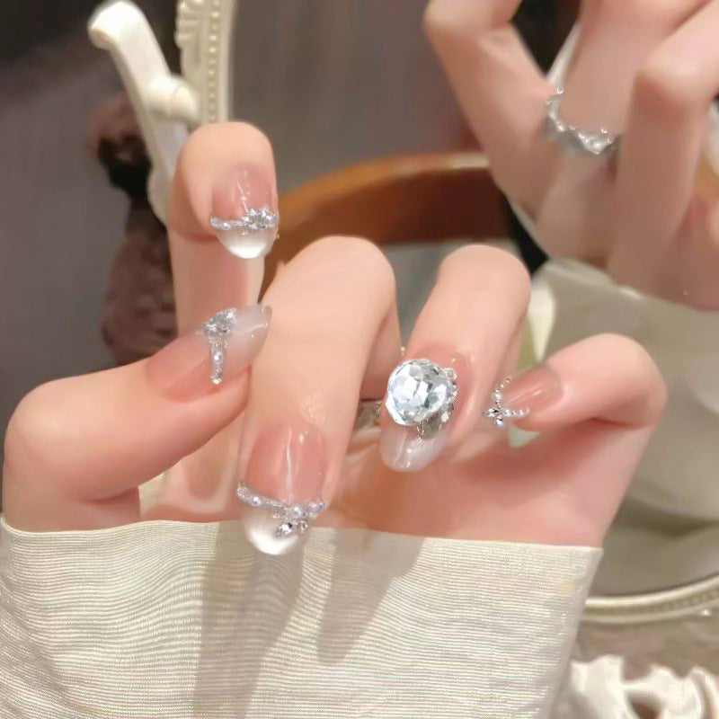 Glamorous Elegance Medium Almond Clear Press On Nail Set with Eye-Catching Gem Accents