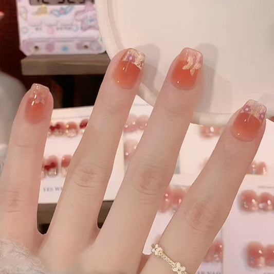 Whimsical Blossom Short Square Ombre Orange Nail Set with Glittery Accent Tips