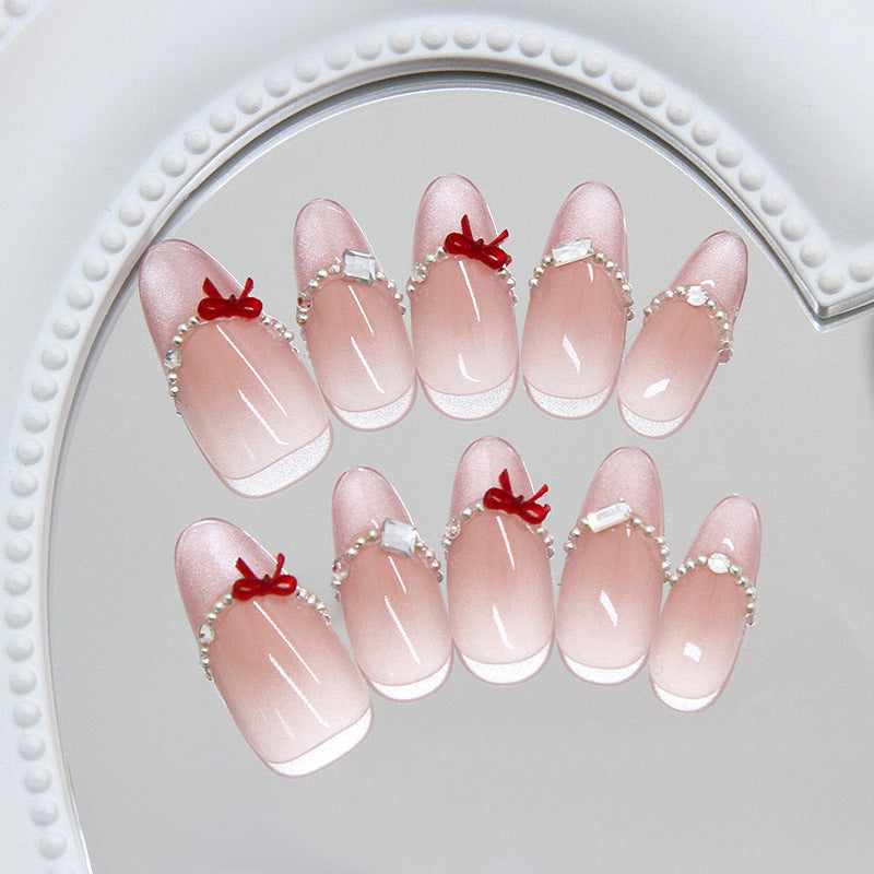 Charming Blossom Press-On Nail Set Long Almond Pink with Elegant Pearl and Bow Accents