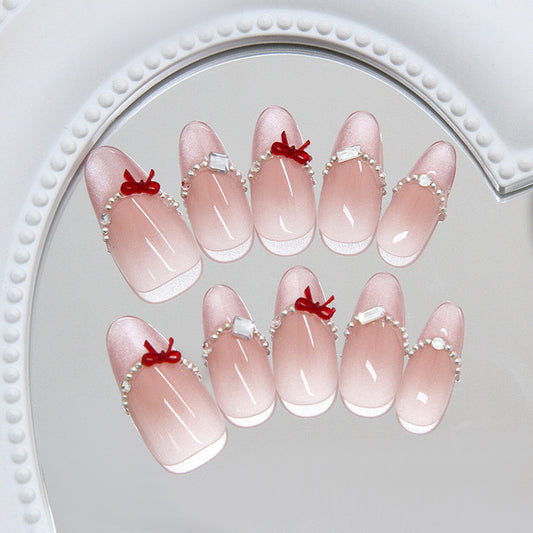 Charming Blossom Press-On Nail Set Long Almond Pink with Elegant Pearl and Bow Accents