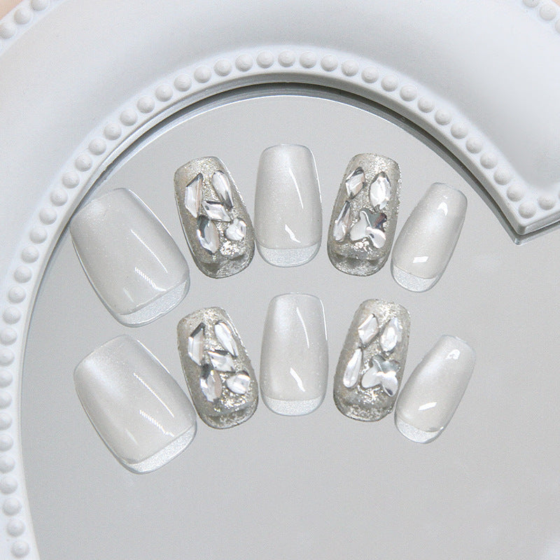 Enchanting Elegance Medium Coffin White Glamour Nails with Stunning Crystal Accents