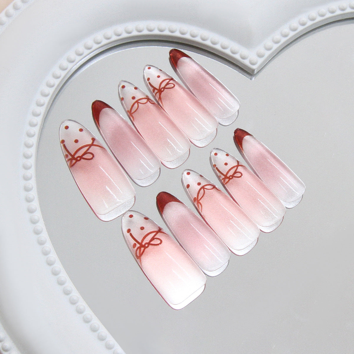 Charming Elegance Long Almond Pink Ombre Press On Nails with Dainty Bow Design