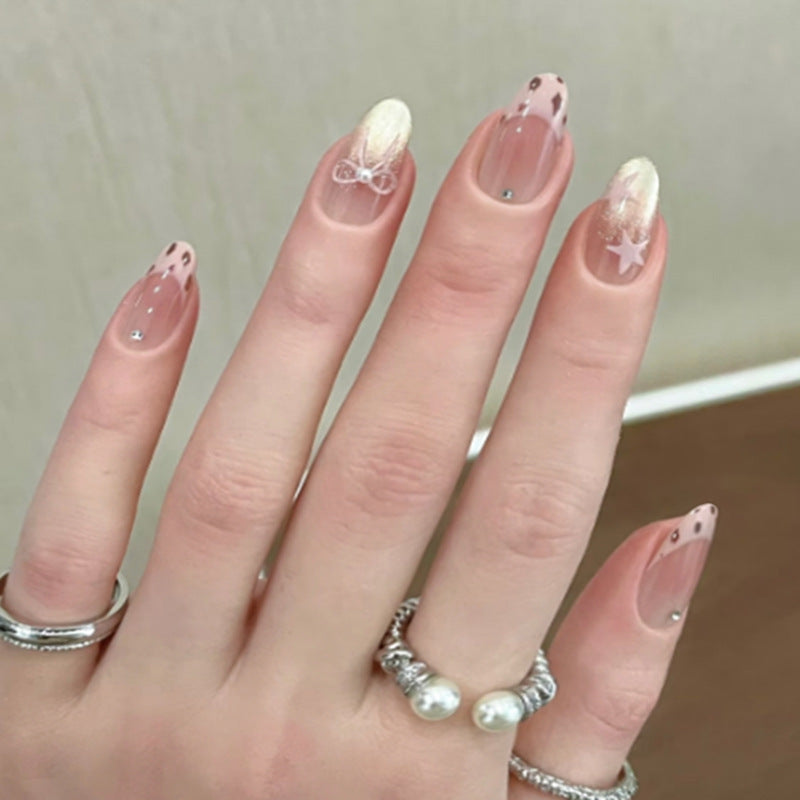Whimsical Elegance Medium Almond Blush Pink with Star and Bow Accent Press On Nail Set