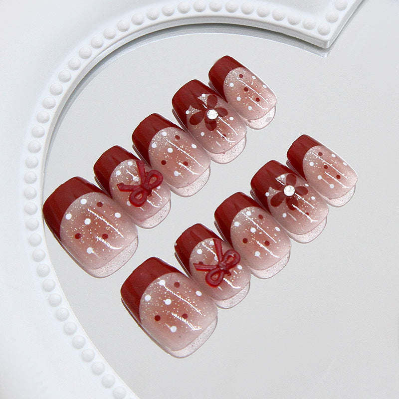 Chic Holiday Elegance Medium Coffin Burgundy Ombre with Floral and Bow Accents Press On Nail Set