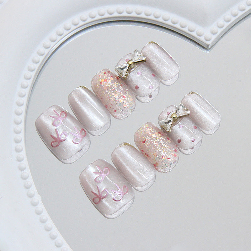 Charming Elegance Short Square Blush Pink Glitter Design with Cute Bow Accents Press-On Nail Set