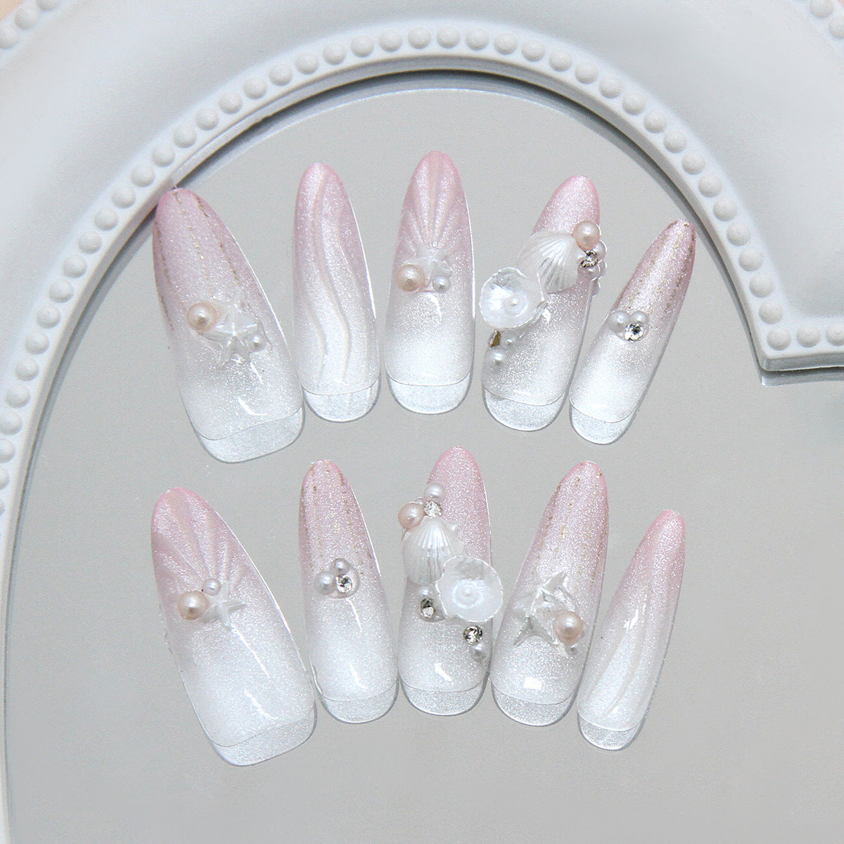 Ocean Breeze Glamour Long Stiletto Ombre White and Pink Press-On Nail Set with Pearl and Shell Accents