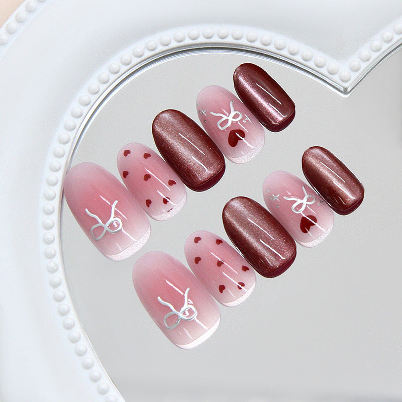 Romantic Elegance Medium Oval Pink with Heart Patterns and Shimmering Accent Press On Nail Set
