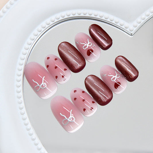 Romantic Elegance Medium Oval Pink with Heart Patterns and Shimmering Accent Press On Nail Set