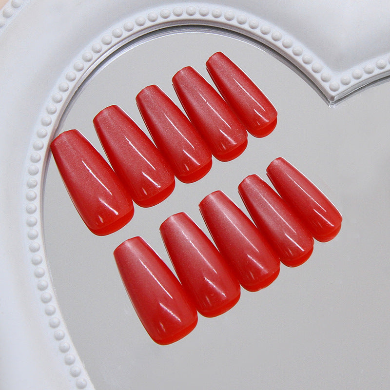 Sunset Glow Chic Long Coffin Press-On Nails in Vibrant Coral with Glossy Finish