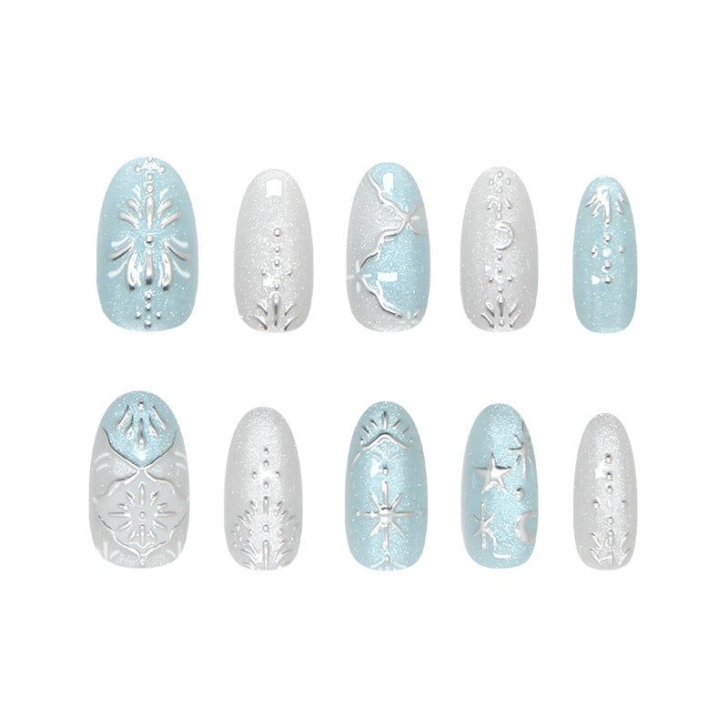 Enchanted Winter Medium Oval Blue Sparkle Press On Nail Set with Intricate Designs