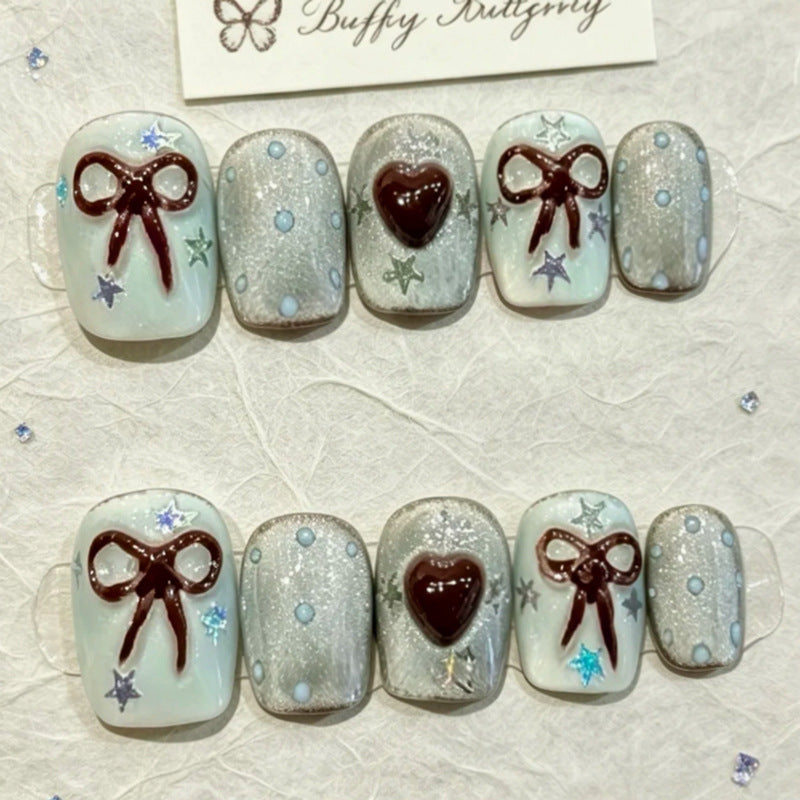 Charming Winter Wonderland Short Square Light Blue Glitter Press-On Nail Set with Heart and Bow Accents