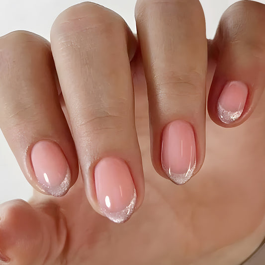 Chic Blossom Short Almond Pink Nails with Glittery Tips for Glamorous Elegance