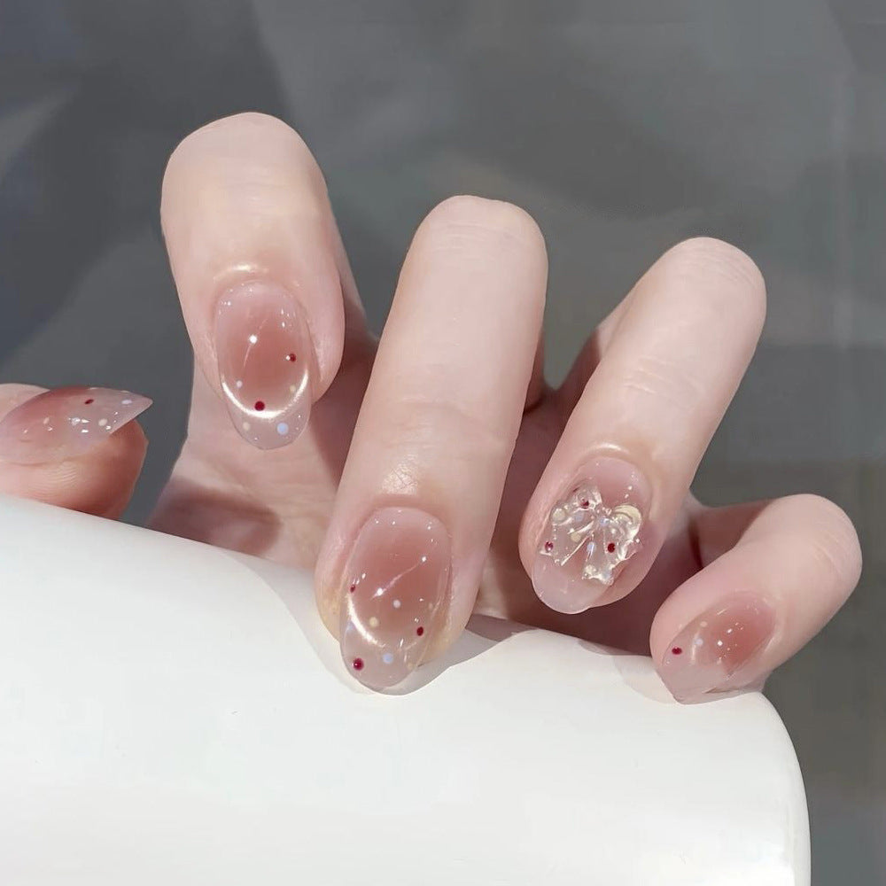 Blossom Elegance Short Oval Pink Transparent Nails with Unique Floral Accent