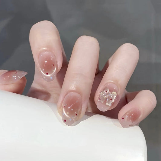 Blossom Elegance Short Oval Pink Transparent Nails with Unique Floral Accent
