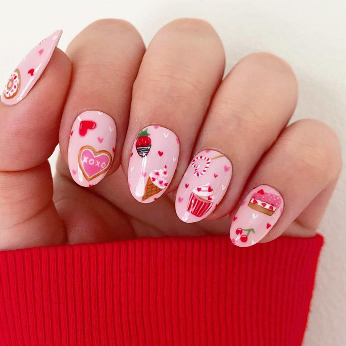 Sweet Treats Delight Short Almond Pink Nails with Whimsical Desserts Design