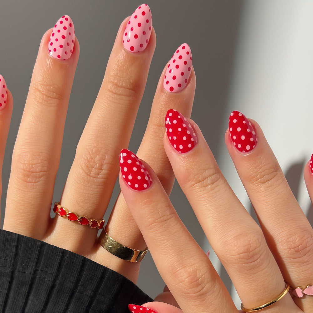 Whimsical Polka Dot Press on Nails in Medium Almond Style with Cheerful Red and Pink Shades Featuring Delightful Dot Pattern