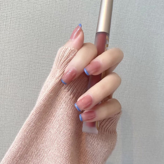 Ocean Bliss Medium Square-Shaped Press On Nails with French Blue Tips and Clear Gradient Design