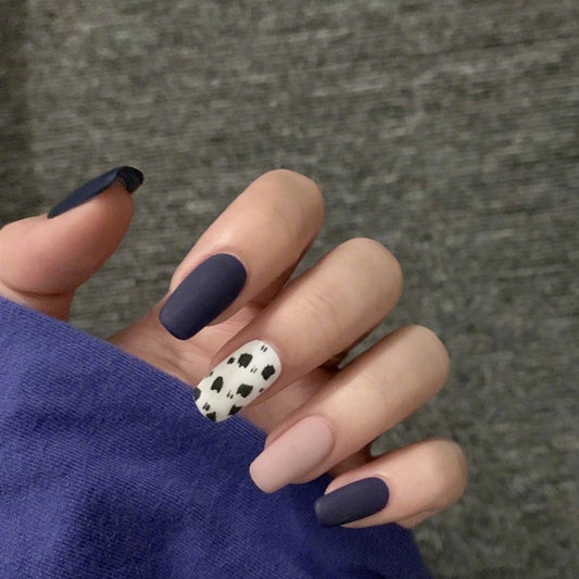 Midnight Chic Medium Square Matte Navy and Beige Press On Nail Set with Cow Print Accent Nail