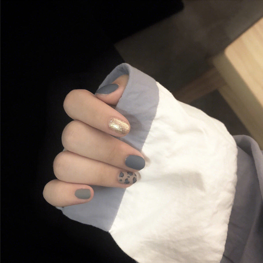 Enchanted Evening Short Round Matte Blue Press On Nail Set with Glitter Accent and Leopard Print Design