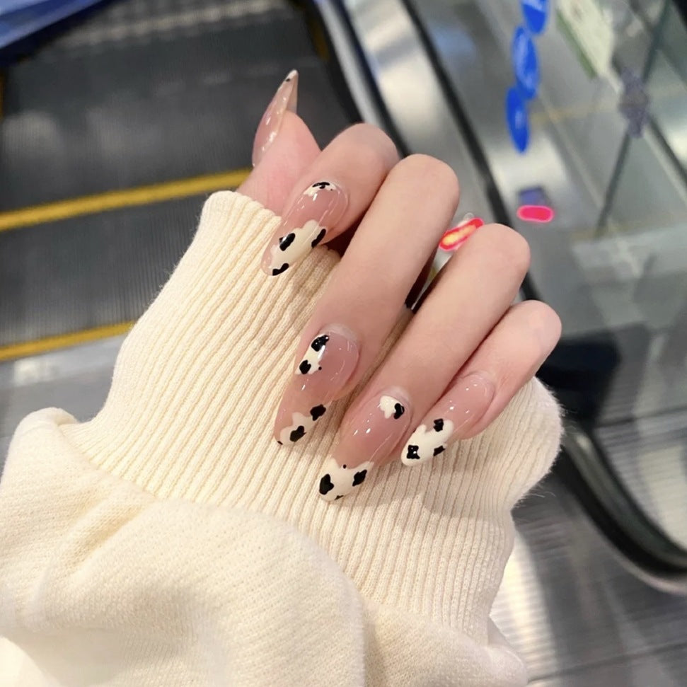 Chic Safari Long Almond Beige Press On Nails with Black Heart Accents