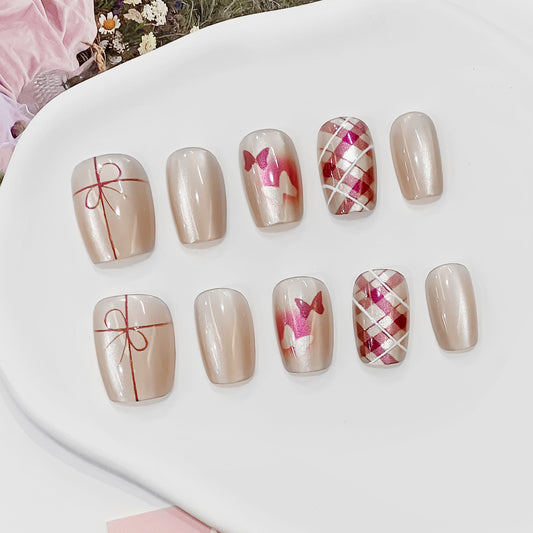 Whimsical Celebration Short Square Press On Nail Set in Elegant Beige with Charming Gift and Bow Designs