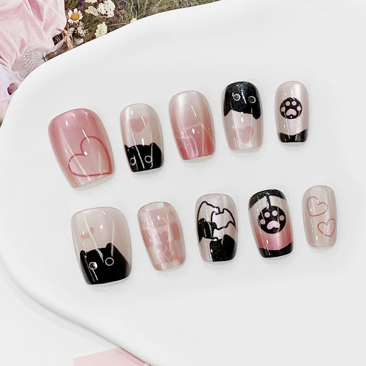 Whimsical Cat Love Short Square Pink and Black Press on Nail Set with Unique Heart and Paw Print Design