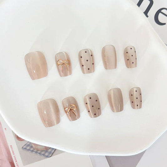 Elegant Whimsy Short Square Beige Glossy Press On Nail Set with Charming Bow and Dots
