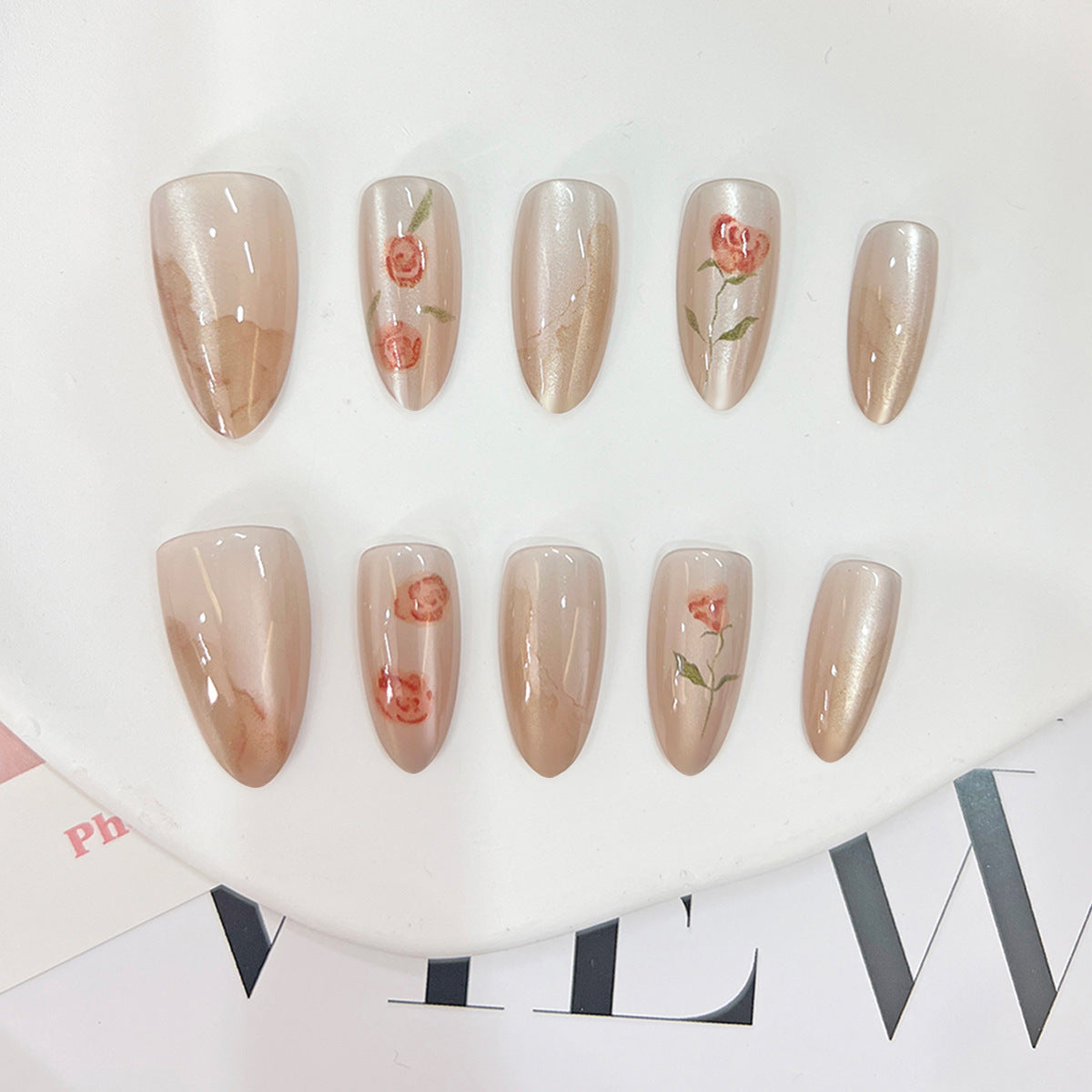 Romantic Blossom Medium Almond Beige Nails with Floral Designs and Shimmering Finish