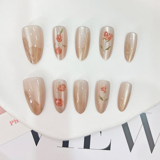 Romantic Blossom Medium Almond Beige Nails with Floral Designs and Shimmering Finish