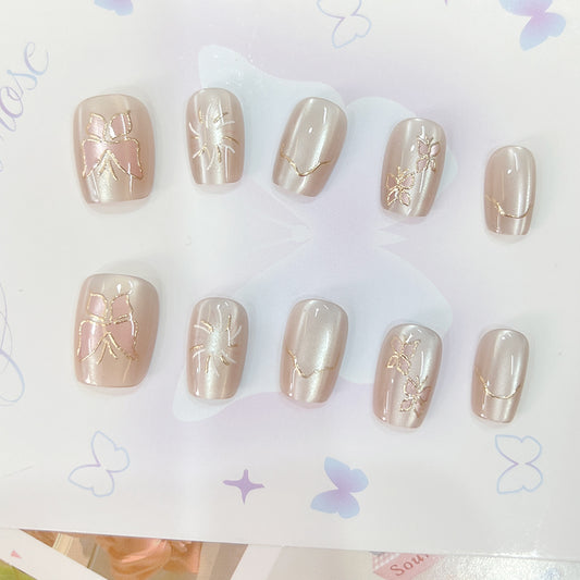Whimsical Elegance Medium Square Beige Press-On Nail Set with Intricate Gold Foil Designs
