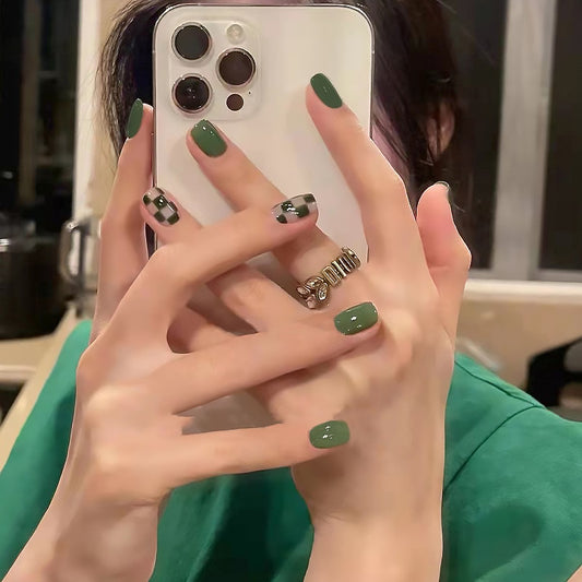 Enchanted Emerald Elegance Short Round Green Press on Nails with Chic Plaid Accents