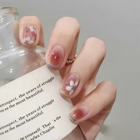 Ethereal Blossom Short Round Shape Press On Nail Set in Pastel Pink with Floral Accent Design