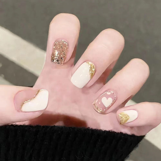 Romantic Bliss Collection Short Round Beige Press On Nails with Gold Glitter Accents and Heart Design
