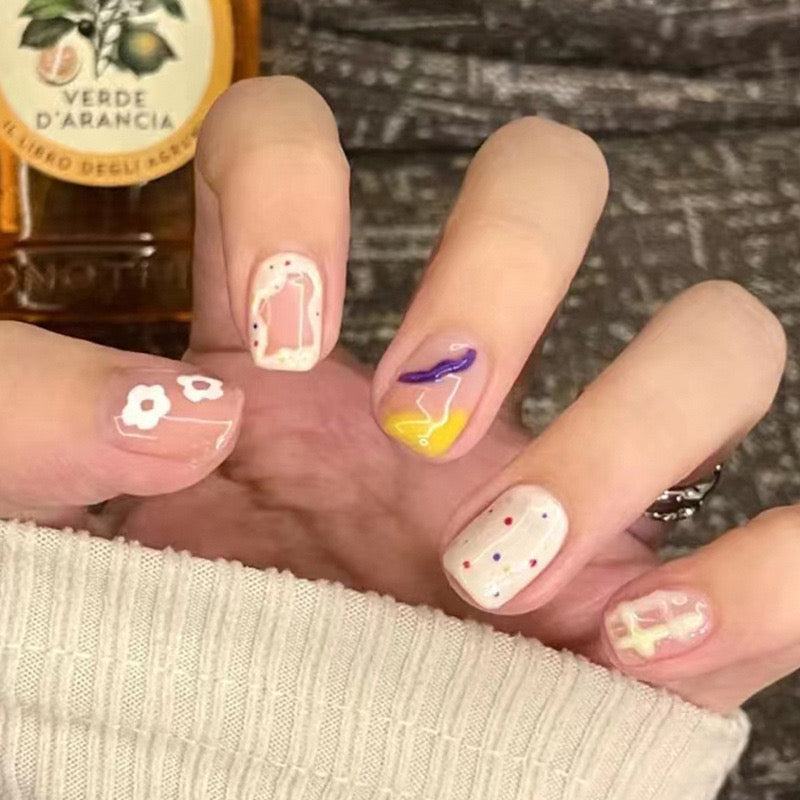 Springtime Fantasy Short Round Pastel Multicolor Press On Nail Set with Hand-Painted Floral Accents