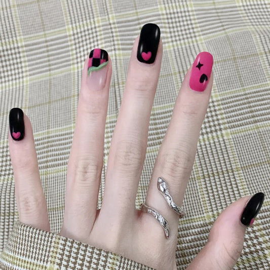 Enchanted Evening Short Round Black and Pink Press On Nail Set with Whimsical Heart Accents and Glossy Finish